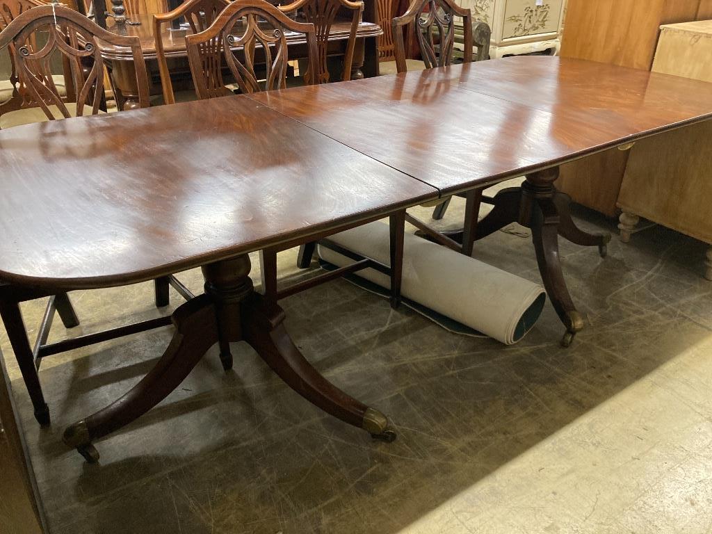 A George IV mahogany twin pedestal dining table, 220cm extended, one spare leaf, width 91cm height 72cm